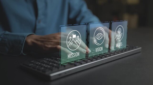 Mission, vision and values concept. Business person working with mission, vision and core values icons, corporate culture, company direction, leadership and strategic planning.