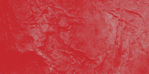 A vibrant red and pink grunge paint texture creates an aged, rough art design on a vintage cement wall surface with a dirty paper material pattern