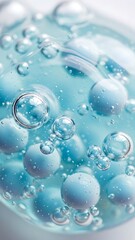 Macro view of blue gel serum with bubbles on transparent surface