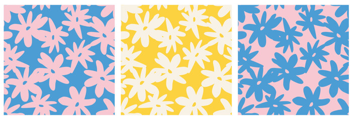 Pastel daisy seamless pattern set in pink, yellow and blue on light backgrounds. Great for fabric, wallpaper, wrapping, stationery, packaging and branding. Fresh summer vibe. bold floral repeat. © Danchenko