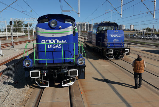 Gdansk, Poland - September 26th 2025 : International railway fair TRAKO 2025. Modernized Newag gazodiesel SM42-729 and 6Dm-02 locomotives in Orion Kolej colors.