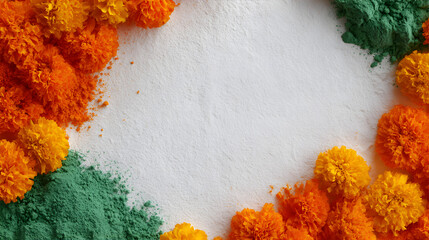 Marigold flower and green gulal powder on white background. Indian festival decoration with bright petals for Gudi Padwa.
