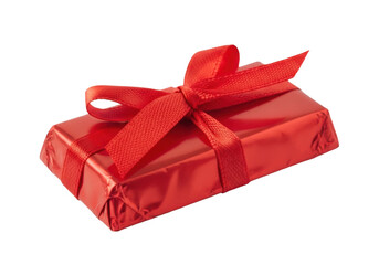 A beautifully wrapped gift box with a vibrant red ribbon and bow. isolated on transparent background