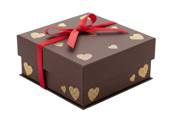 An elegantly wrapped gift box with a vibrant red ribbon and gold accents. isolated on transparent background