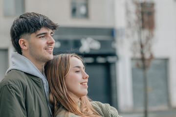 Fototapeta premium urban young couple on the street hugging