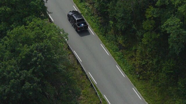Scenic Scandinavian bridge over calm fjord village waterway