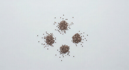 Chia seeds scattered on light surface, minimal nutrition concept