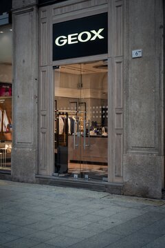 Milan, Italy - 2026, 3 Feb: Geox FW25 boutique with modern glass entrance, chic retail display, and stylish Italian fashion showcased in a luxury city setting