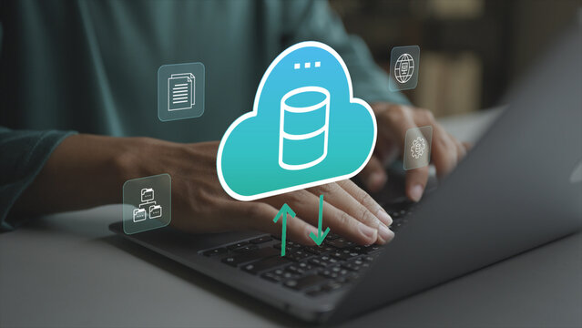 Cloud data management concept. Business person working on laptop with cloud computing and data storage icons, secure data processing, backup, synchronization and scalability.