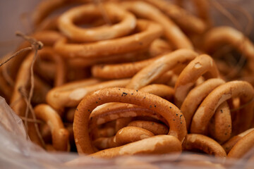 A bunch of fresh vanilla bagels in the basket