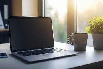 Fototapeta premium Modern Laptop On Bright Desk With Coffee Mug And Potted Plant