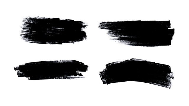Set of Textured Black Ink Brush Strokes and Hand-Drawn Paint Smear Design Elements
