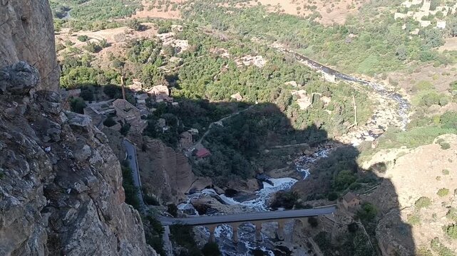 Aerial view of the city of Constantine and the serpentine mountain road