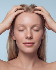 Naklejka premium Dewy skincare beauty portrait of blonde woman with freckles and relaxing scalp massage 
