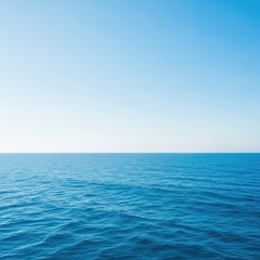 Obraz premium A sweeping, ultra-wide view of the deep blue ocean horizon under a clear sky, showing the vastness of the natural world, calm, idyllic, infinite