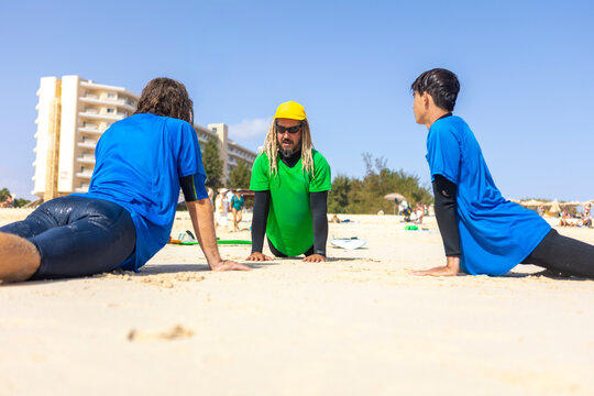 Surf lesson for autistic individuals on the beach