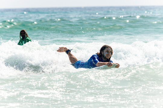 Surfing as positive therapy for autism spectrum individuals