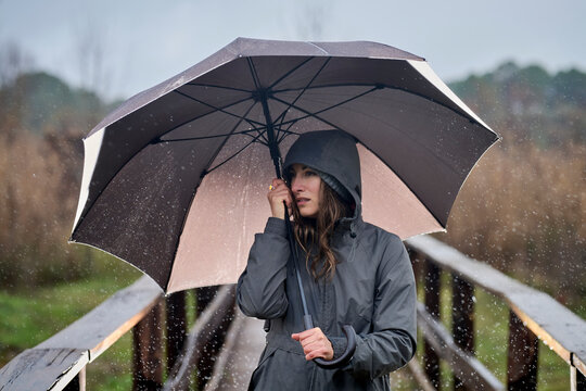Woman with umbrella on a rainy day