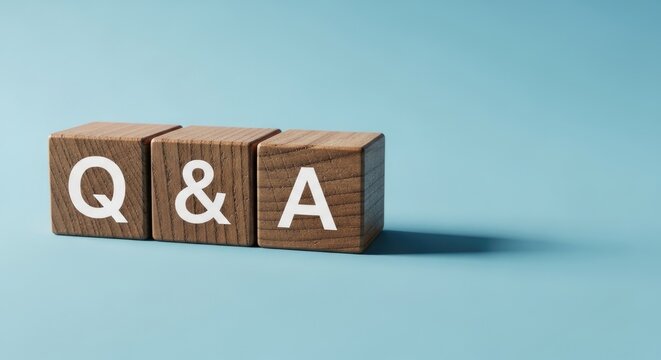 Q a wooden blocks on blue background for questions and answers