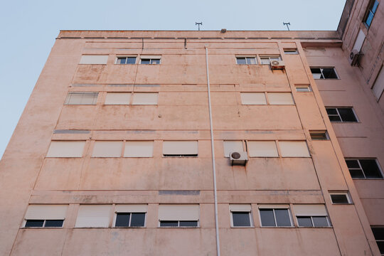 Exterior of a large residential building with windows