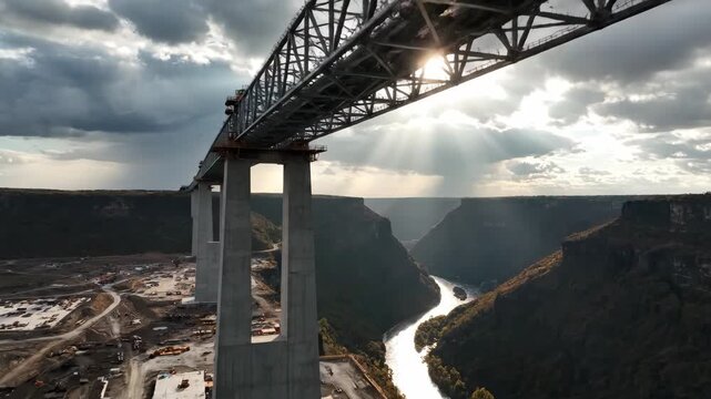 Perrine bridge construction with river canyon and dramatic clouds at sunset engineering marvel in the snake river canyon