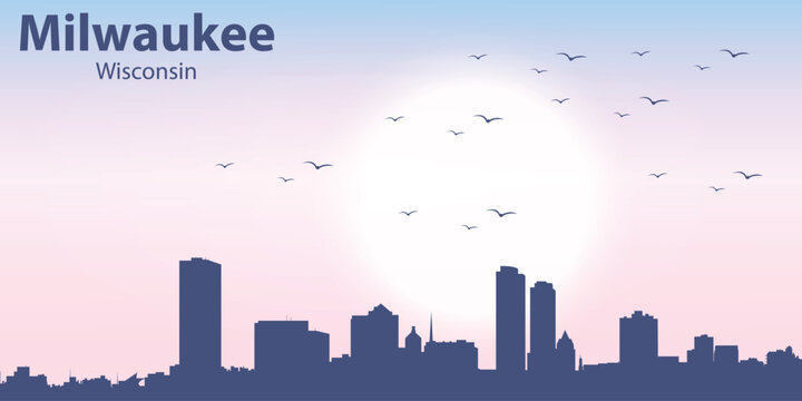 Stylized skyline of Milwaukee, Wisconsin at sunrise. Minimal flat illustration with city silhouette, soft pastel gradient sky, sun and flying birds.