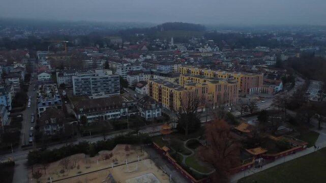 Aerial view of Zurich Lake and city skyline during a misty winter day, Switzerland.