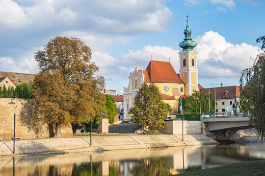 The Carmelite church and bridge over Raba river in Győr - Hungary