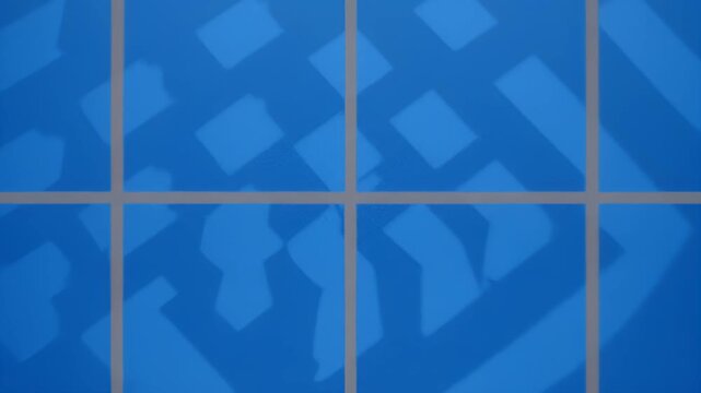 Abstract blue grid with geometric shadow patterns and soft lighting