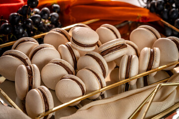 Chocolate Macarons On Luxury Dessert Tray