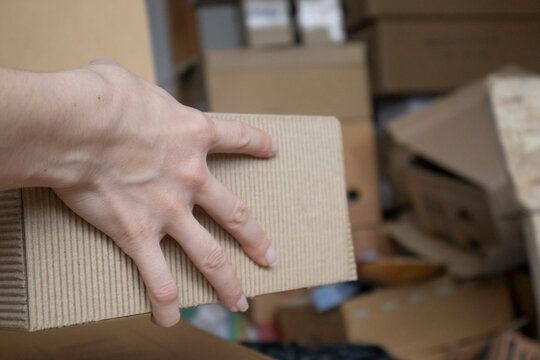 Sorting old things and decluttering home storage.
