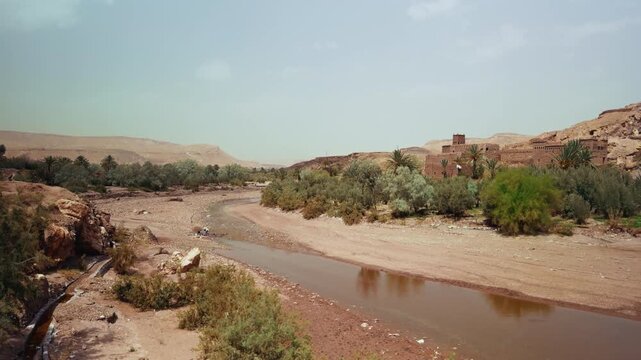 Almost Dry River Flowing Near The Town Of Ouarzazate 