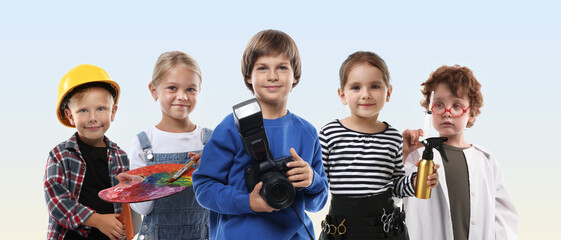 Obraz premium Choice of future profession. Happy children dressed as workers in different occupations. Gradient background
