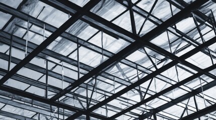 Abstract View of a Modern Architectural Structure with Steel Beams and Glass Panels Capturing Light and Shadows in a Dynamic Urban Setting