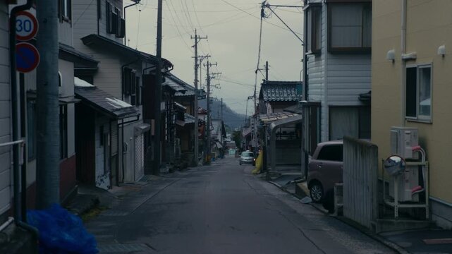Peaceful Japanese onsen town nestled in snowy mountains of Nagano