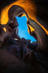 Stunning view of canyon opening with smooth rock formations and bright sunlight illuminating edges without potholes Lei Dan Stone Field Thailand