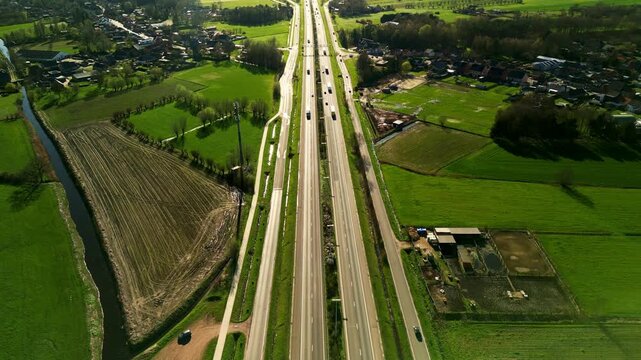 Aerial view of E34 highway in East Flanders, Belgium - Dolly shot move