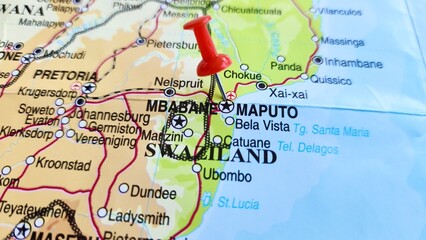 Fototapeta premium View of Maputo, Capital and chief port of Mozambique, on a geographical map of Africa, marked with red pushpin