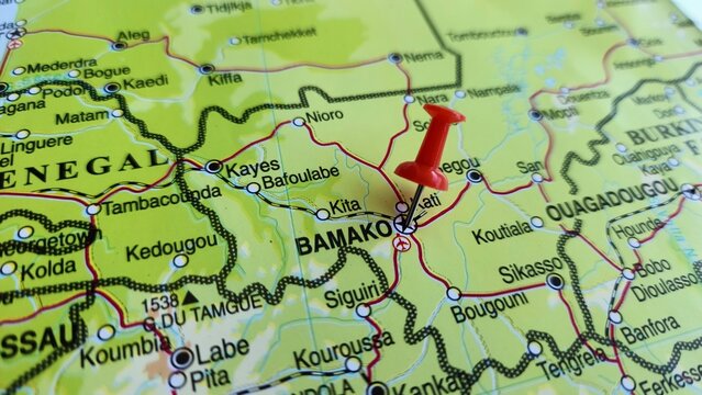 View of Bamako is the capital and largest city of Mali, West Africa, on a geographical map of Africa, marked with a red pushpin.