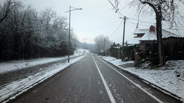 Winter Walk Along Quiet Road With Snow And Streetlights