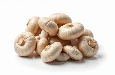 Raw oyster mushrooms pile up on white background. These edible fungi are natural ingredient for healthy cooking. Great for food blogs, menus, and farm to table concepts.