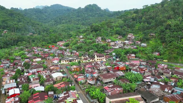 Aerial view from Ribeira Afonso village with the mountains in background,Sao Tome,Africa.
Backwards drone shot sunny day