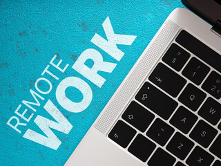 Remote work concept with laptop on blue background