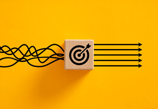 Wooden cube block transforming chaos into business strategic goal