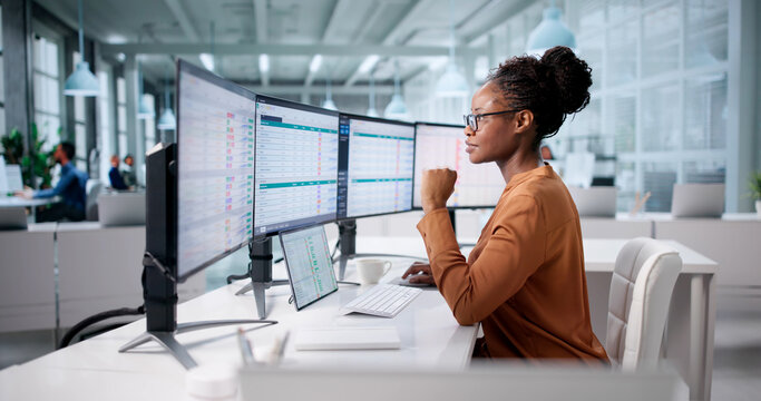 Medical Records Billing In Office: Woman Using Spreadsheet