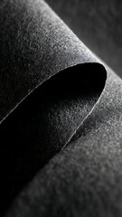 Dark gray paper texture with rolled edge and shadow