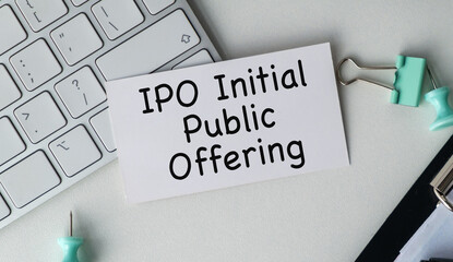There is notebook with the word Initial Public Offering. It is as an eye-catching image.