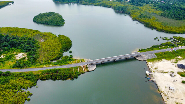 Aerial view of opobo flyover surrounded by rivers and  beautiful green vegetations in Rivers state, Nigeria