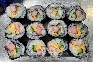 Traditional Japanese Maki Sushi Rolls with Crab Stick and Cucumber © Chayan