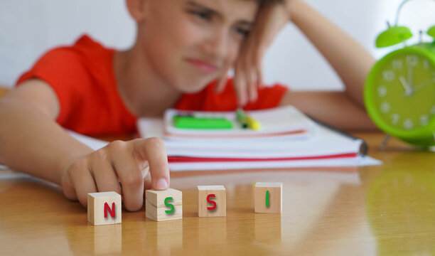 NSSI. Pre-adolescent child student with the acronym for this disorder